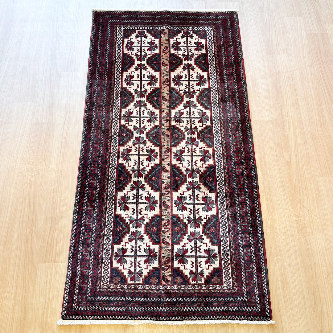 トライバルラグ<br>イラン産 バルーチ<br>リビングサイズ 207×104