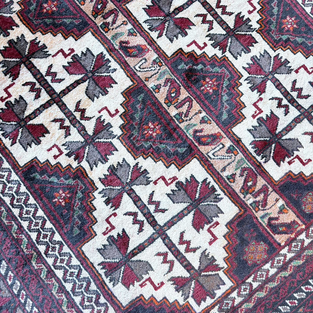 トライバルラグ<br>イラン産 バルーチ<br>リビングサイズ 207×104