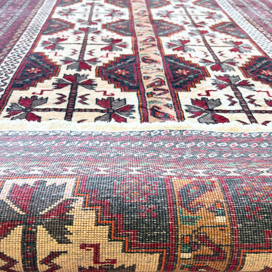 トライバルラグ<br>イラン産 バルーチ<br>リビングサイズ 207×104