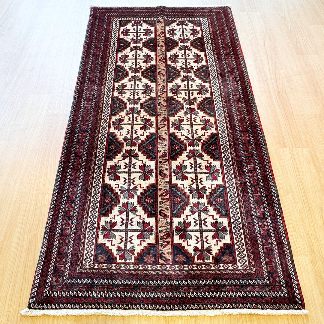 トライバルラグ<br>イラン産 バルーチ<br>リビングサイズ 207×104